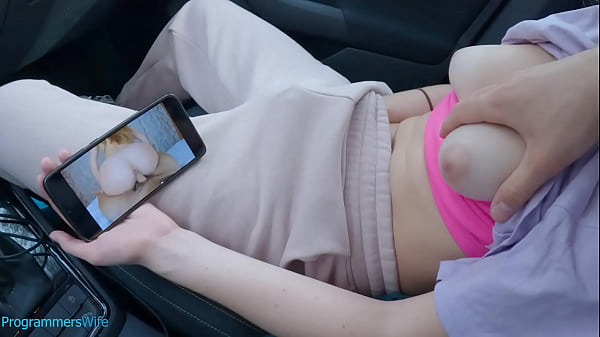 Teen masturbates on a public car park watching her porn video - ProgrammersWife